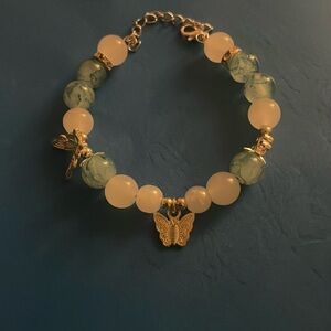 A Butterfly Bangle With charms